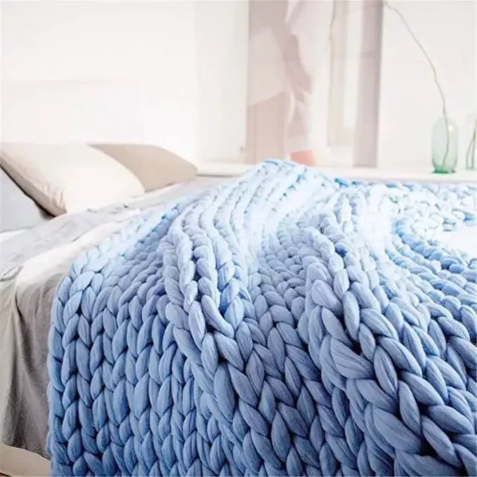 Pale blue weighted blanket in large knit weave